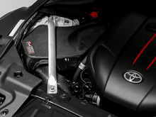 Load image into Gallery viewer, AWE Tuning 2020+ Toyota GR Supra S-FLO Carbon Intake Lid - Siegewerks
